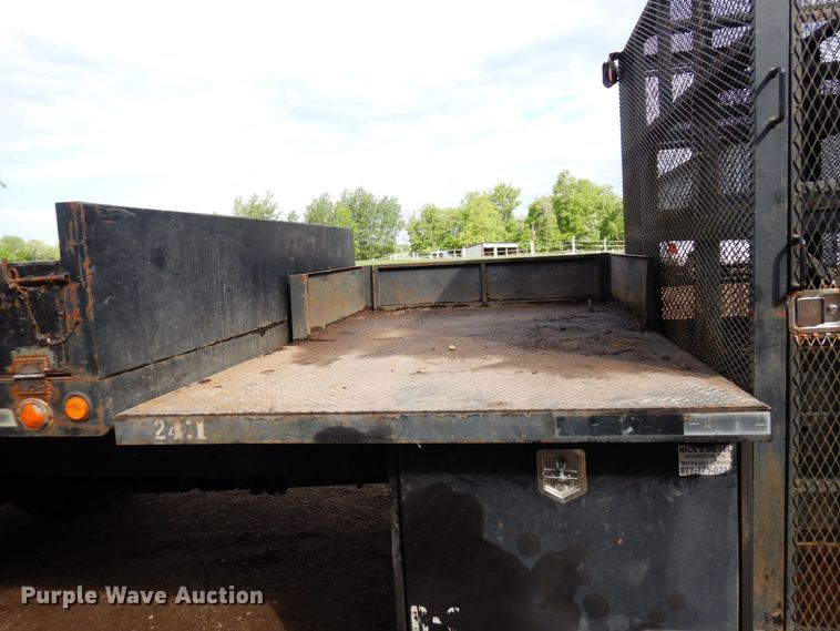 image for item AF9700 2003 Freightliner FL70  dump flatbed truck