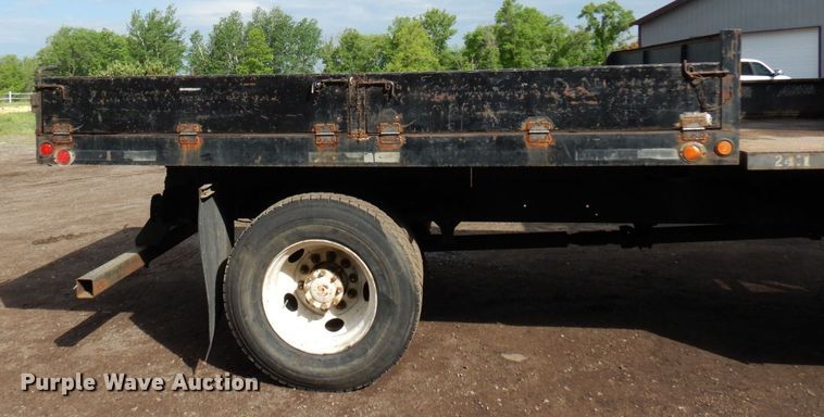 image for item AF9700 2003 Freightliner FL70  dump flatbed truck