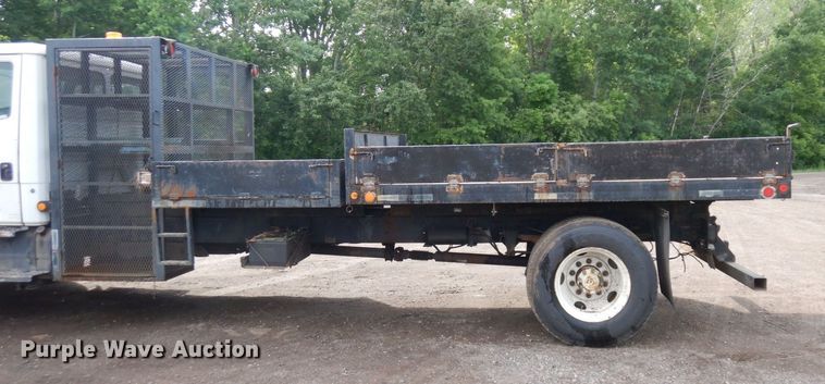 image for item AF9700 2003 Freightliner FL70  dump flatbed truck