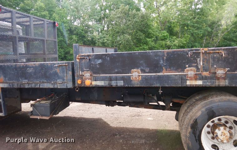 image for item AF9700 2003 Freightliner FL70  dump flatbed truck