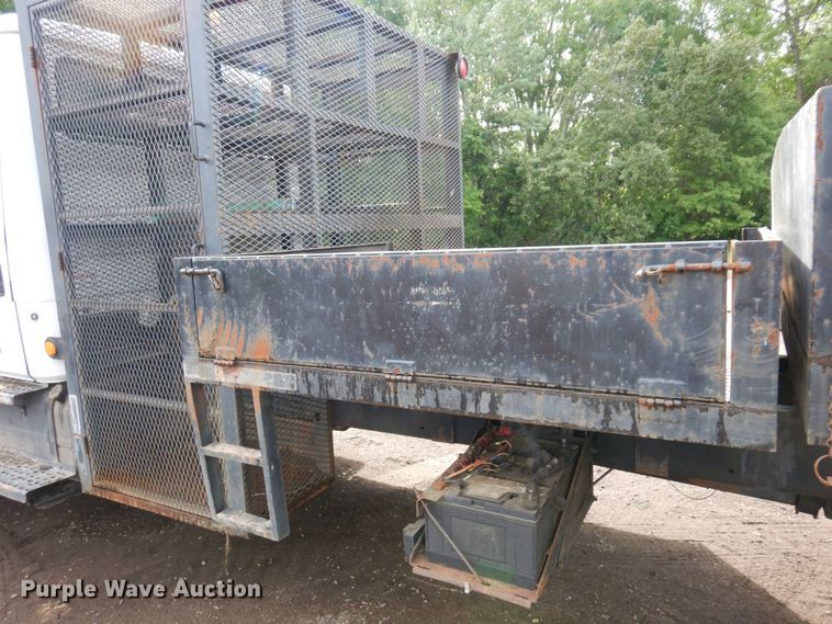 image for item AF9700 2003 Freightliner FL70  dump flatbed truck