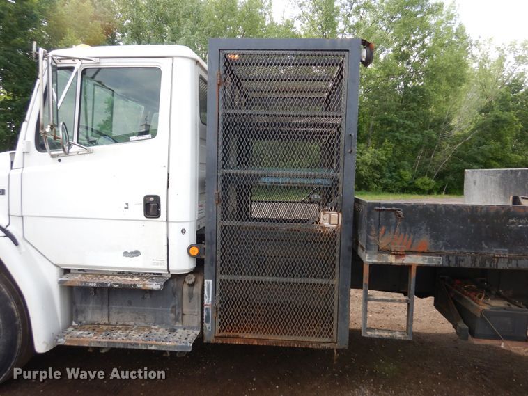 image for item AF9700 2003 Freightliner FL70  dump flatbed truck