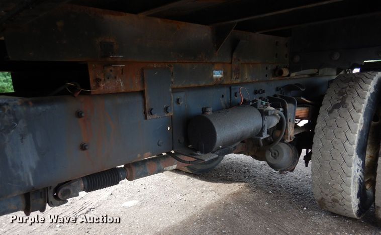 image for item AF9700 2003 Freightliner FL70  dump flatbed truck