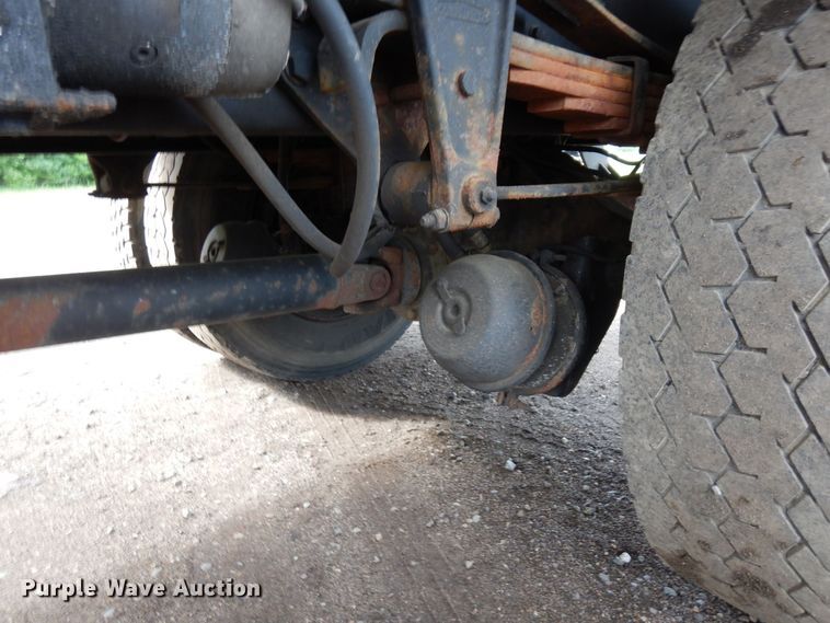 image for item AF9700 2003 Freightliner FL70  dump flatbed truck