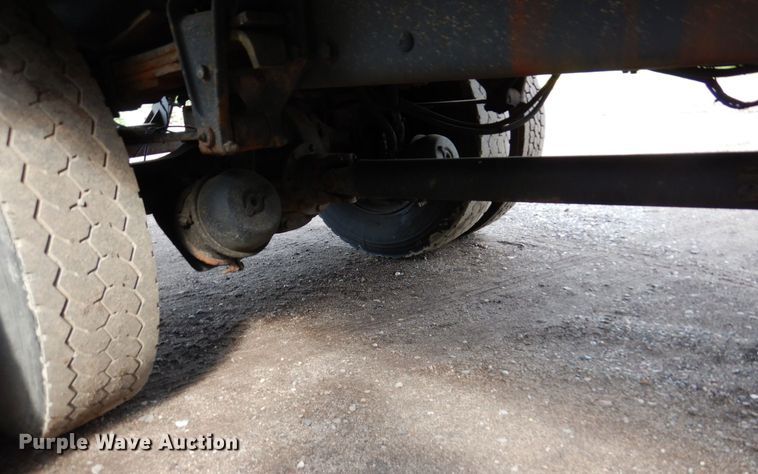 image for item AF9700 2003 Freightliner FL70  dump flatbed truck