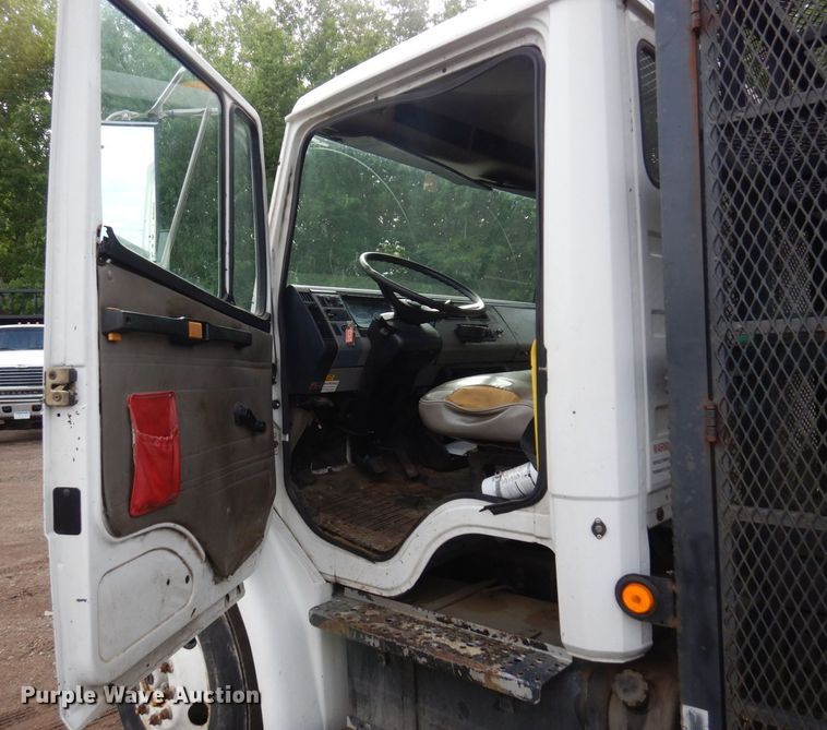 image for item AF9700 2003 Freightliner FL70  dump flatbed truck