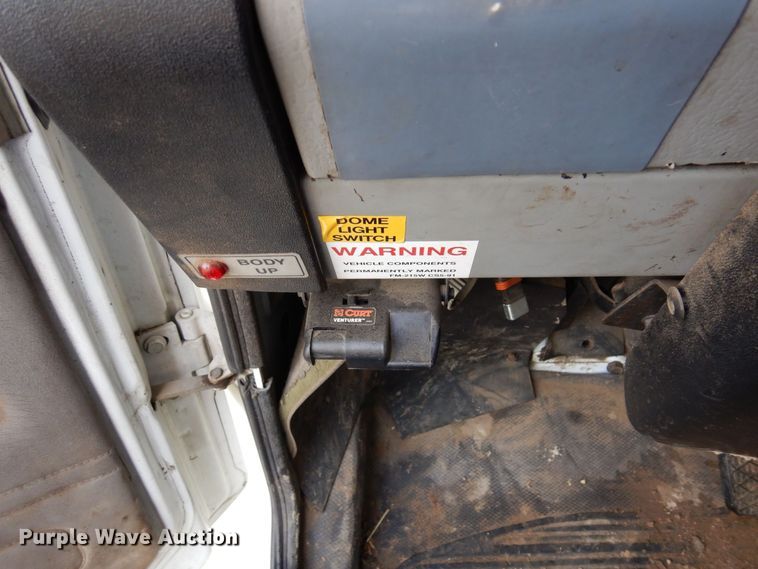 image for item AF9700 2003 Freightliner FL70  dump flatbed truck