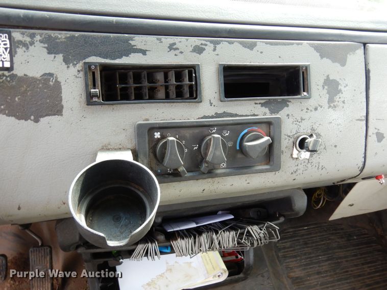 image for item AF9700 2003 Freightliner FL70  dump flatbed truck