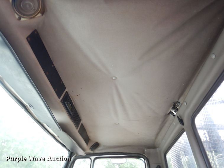 image for item AF9700 2003 Freightliner FL70  dump flatbed truck