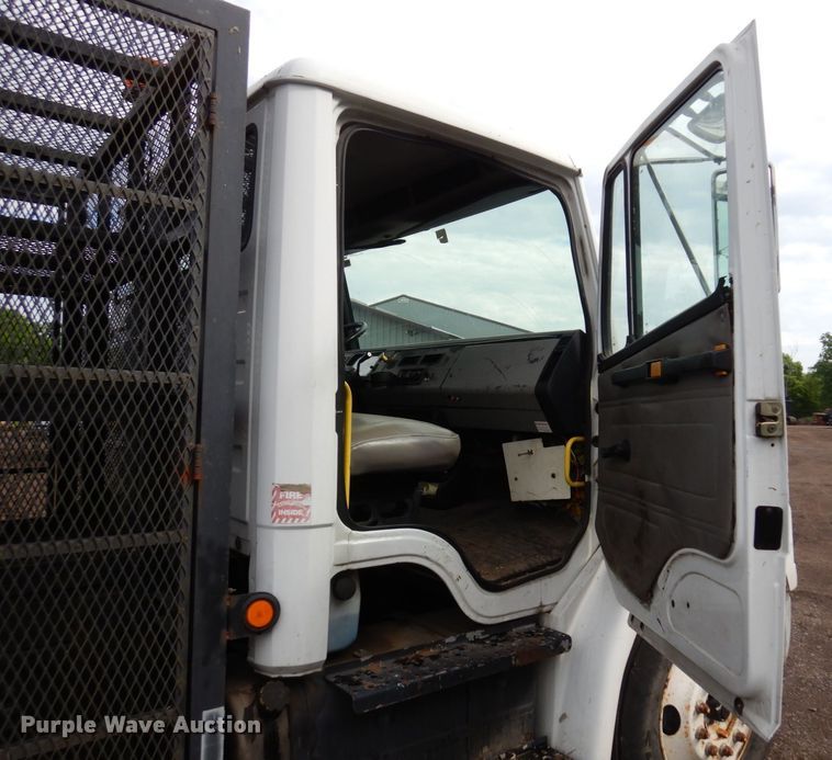 image for item AF9700 2003 Freightliner FL70  dump flatbed truck