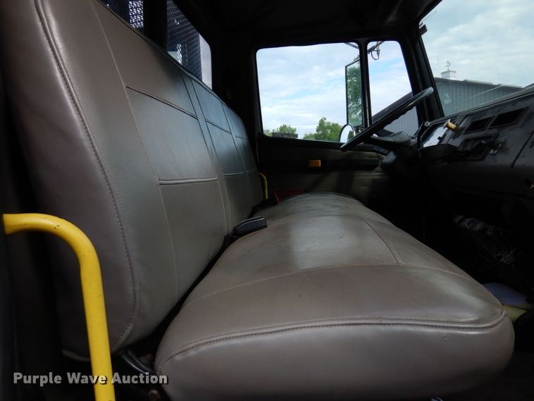 image for item AF9700 2003 Freightliner FL70  dump flatbed truck