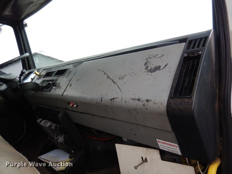 image for item AF9700 2003 Freightliner FL70  dump flatbed truck