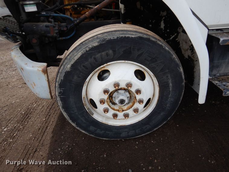 image for item AF9700 2003 Freightliner FL70  dump flatbed truck