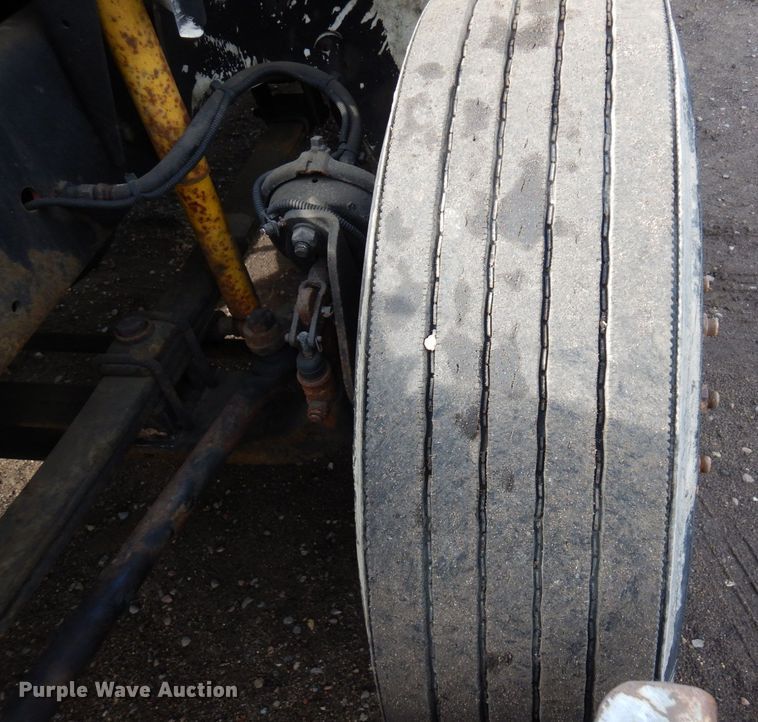 image for item AF9700 2003 Freightliner FL70  dump flatbed truck