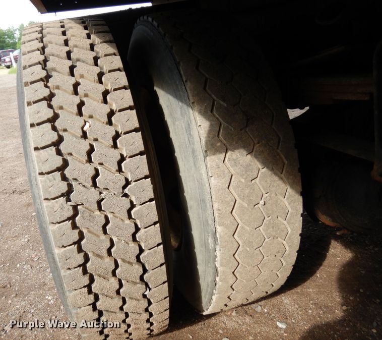 image for item AF9700 2003 Freightliner FL70  dump flatbed truck