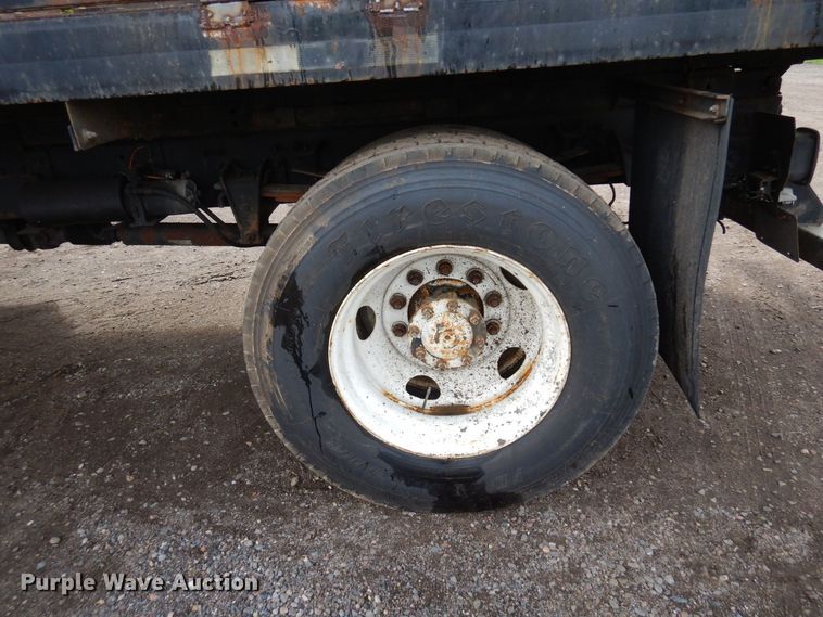 image for item AF9700 2003 Freightliner FL70  dump flatbed truck