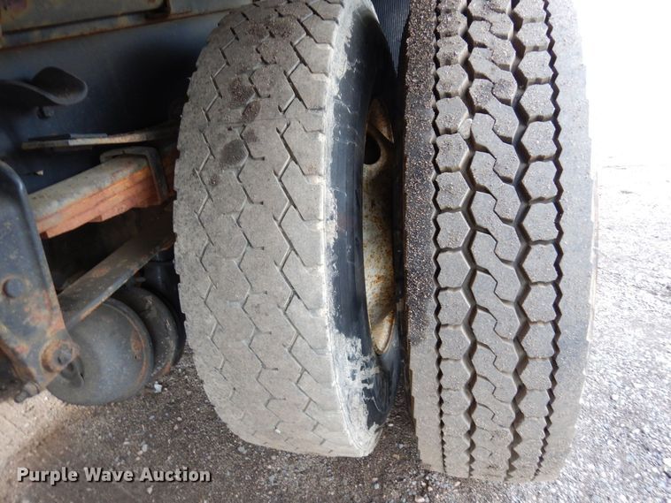 image for item AF9700 2003 Freightliner FL70  dump flatbed truck