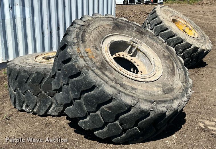 image for item DN3033 (4) 23.5R25 wheels and tires