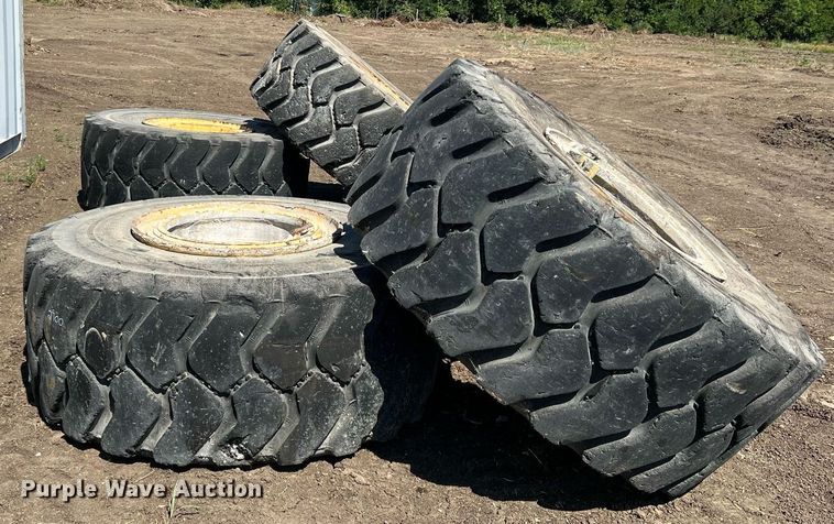 image for item DN3033 (4) 23.5R25 wheels and tires