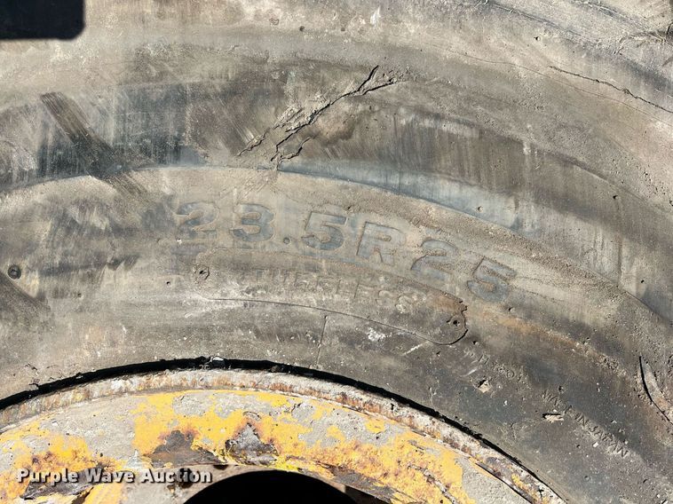 image for item DN3033 (4) 23.5R25 wheels and tires