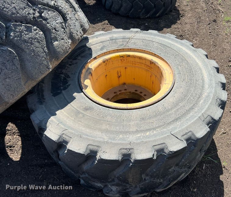 image for item DN3033 (4) 23.5R25 wheels and tires