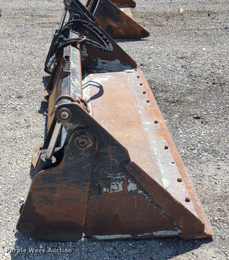 image for item DO5048 Caterpillar  4-in-1 skid steer bucket