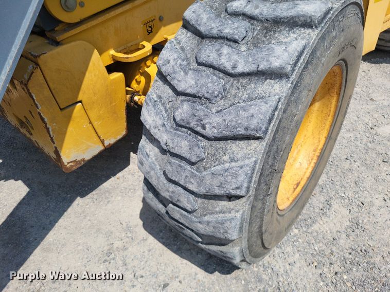 image for item DP5177 2010 John Deere 710J  backhoe