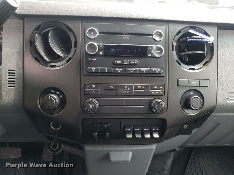 image for item DP7942 2016 Ford F450 Super Duty  Crew Cab flatbed truck