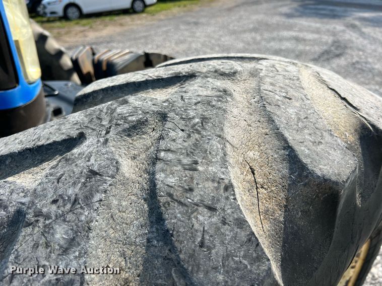 image for item II9073 2003 New Holland TG210  MFWD tractor