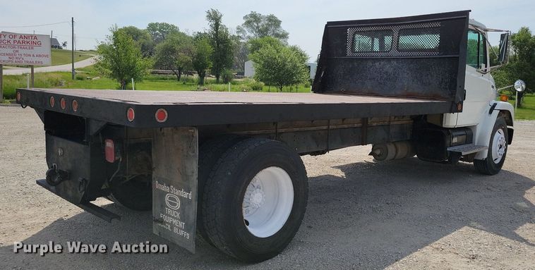 image for item JO9173 1997 Freightliner FL70  flatbed truck