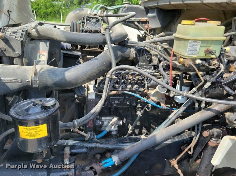 image for item JO9173 1997 Freightliner FL70  flatbed truck