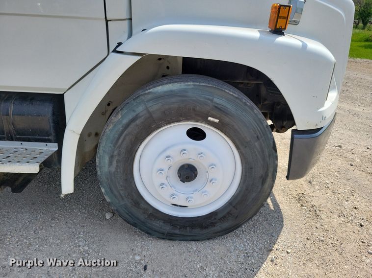 image for item JO9173 1997 Freightliner FL70  flatbed truck