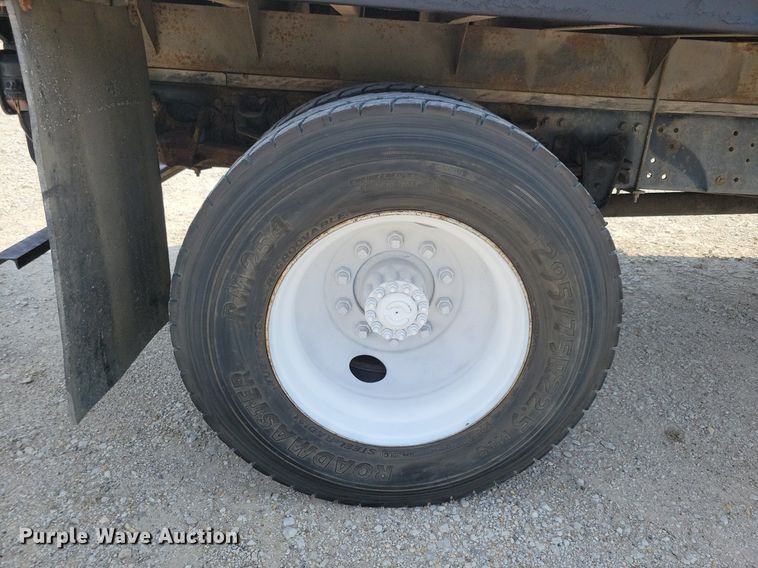 image for item JO9173 1997 Freightliner FL70  flatbed truck