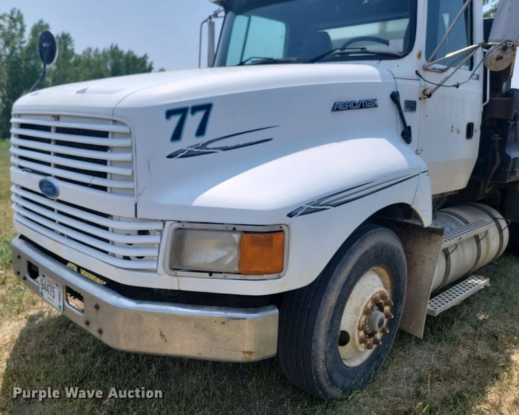 image for item ML9461 1993 Ford LTL9000  dump flatbed truck