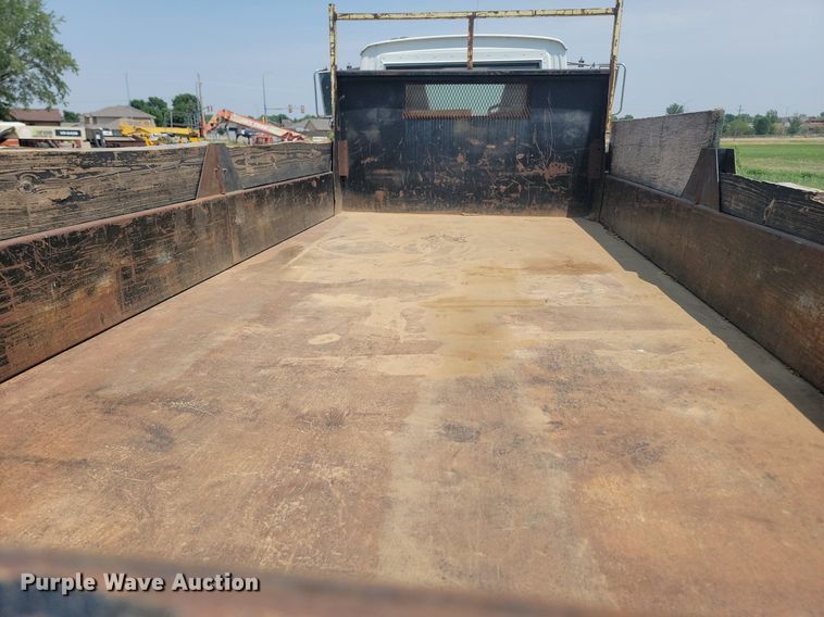 image for item ML9461 1993 Ford LTL9000  dump flatbed truck