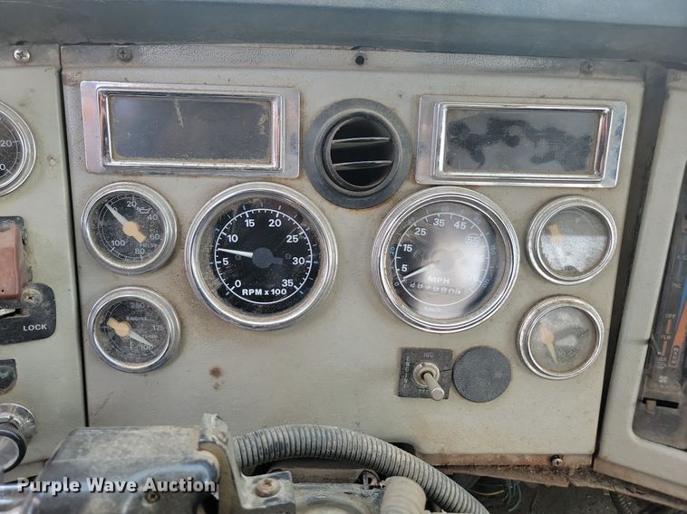 image for item ML9461 1993 Ford LTL9000  dump flatbed truck