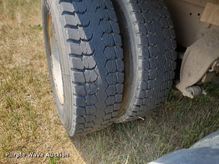 image for item ML9461 1993 Ford LTL9000  dump flatbed truck