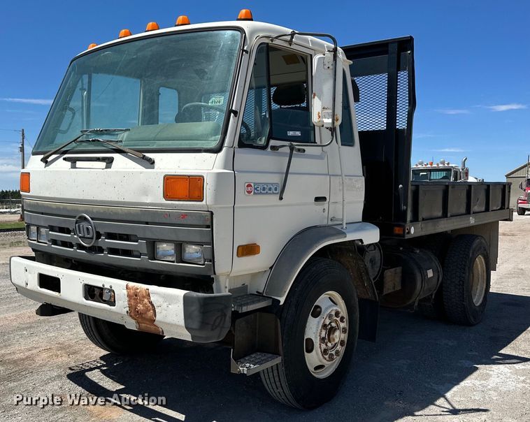 image for item NY9061 1993 UD Nissan UD3000  dump flatbed truck