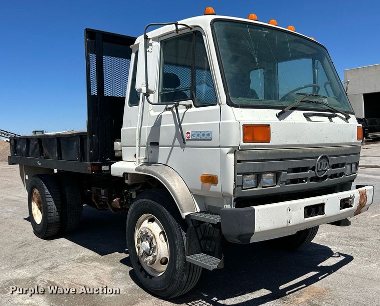 image for item NY9061 1993 UD Nissan UD3000  dump flatbed truck