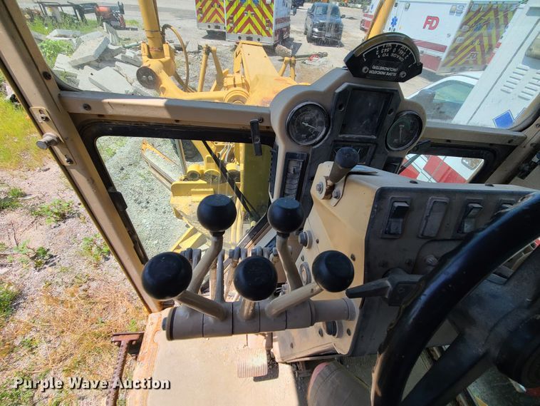 image for item DM4982 1999 Caterpillar 143H  motor grader