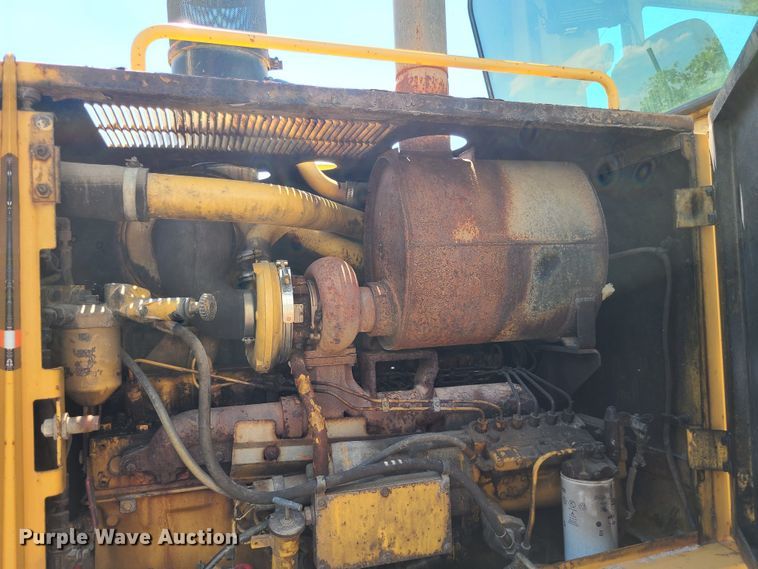 image for item DM4982 1999 Caterpillar 143H  motor grader