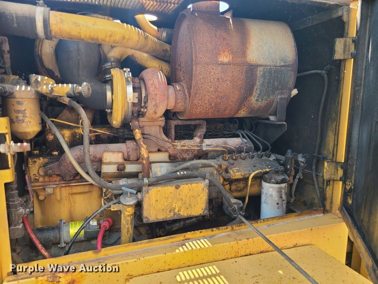 image for item DM4982 1999 Caterpillar 143H  motor grader