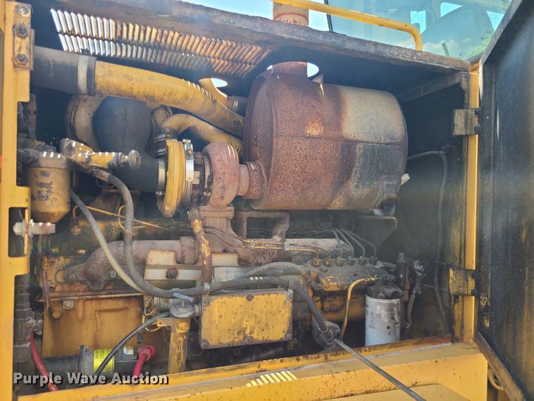 image for item DM4982 1999 Caterpillar 143H  motor grader