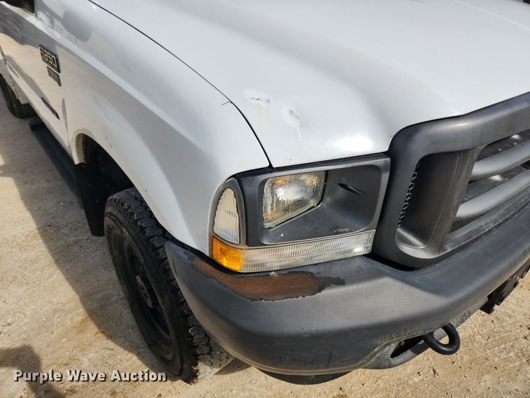 image for item JB9554 2003 Ford F350 Super Duty XL  utility bed pickup truck