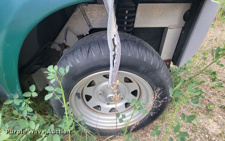 image for item ML9432 (3) 2002 Ford Think golf carts