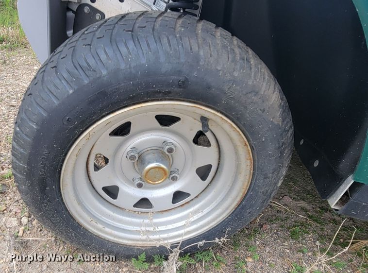 image for item ML9433 (2) 2002 Ford Think golf carts