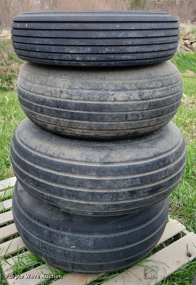 image for item JO9072 (15) Firestone 14L-16.1 tires