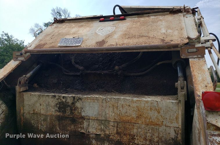 image for item DP8028 2004 Chevrolet C6500  refuse truck