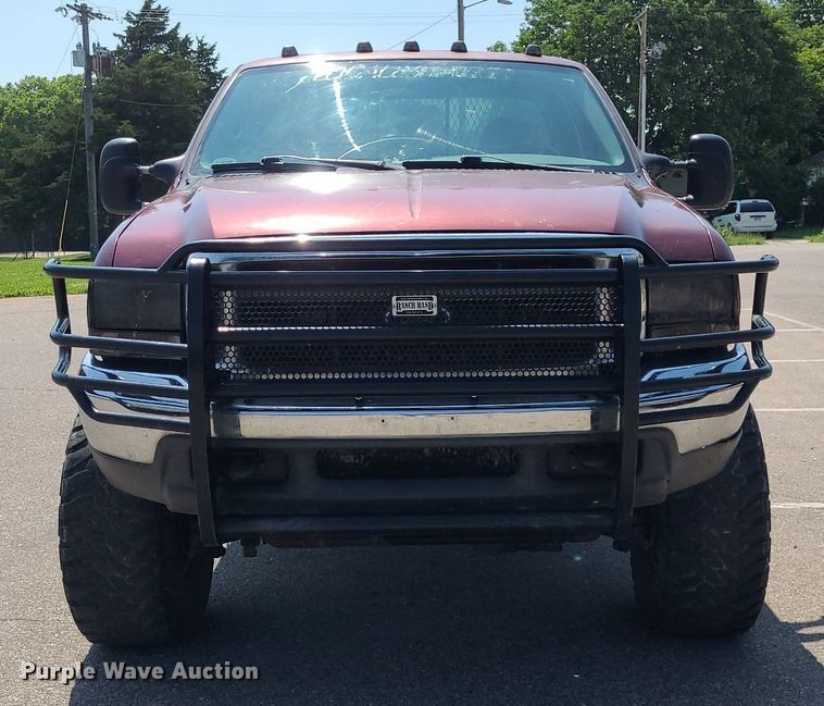 image for item DK1969 2000 Ford F250 Super Duty XLT  SuperCab flatbed pickup truck