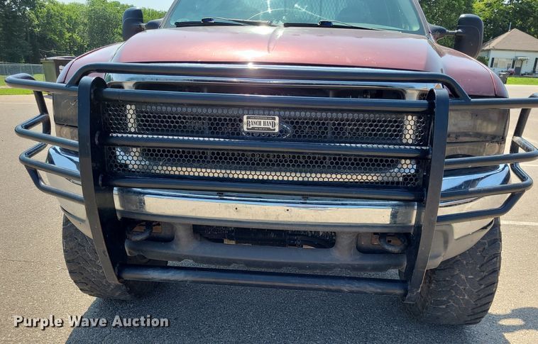 image for item DK1969 2000 Ford F250 Super Duty XLT  SuperCab flatbed pickup truck